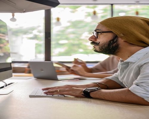 Taking a short pause during a regular workday, looking away from the screen